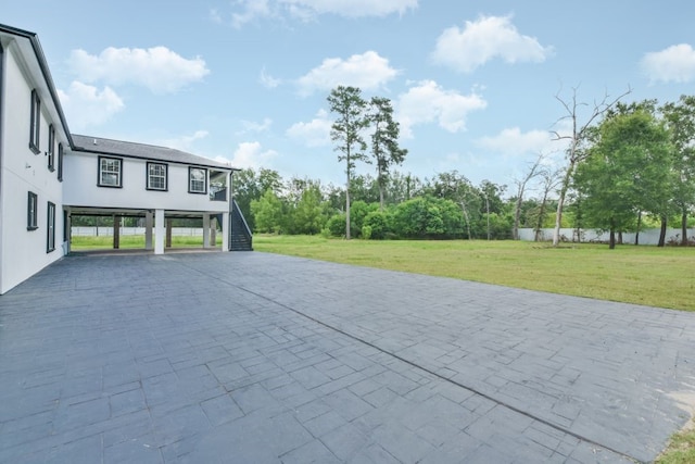 view of patio / terrace with a carport