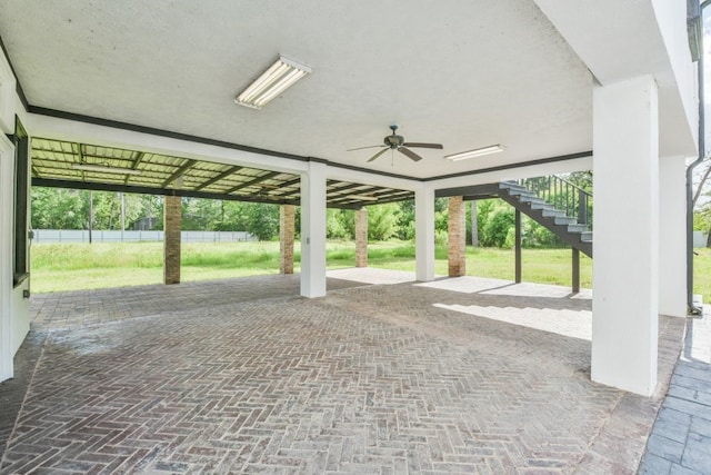 view of patio / terrace featuring ceiling fan