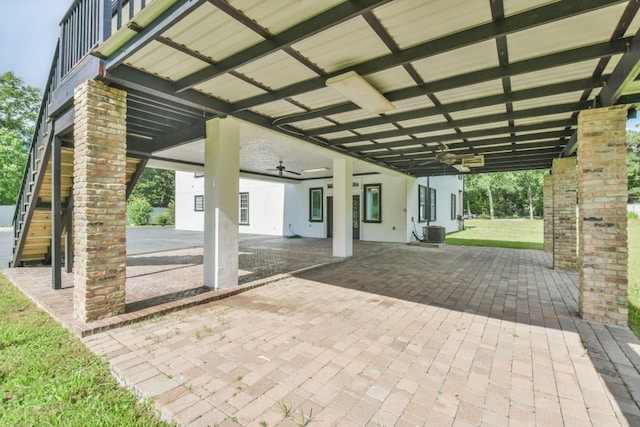 view of patio featuring ceiling fan and central air condition unit