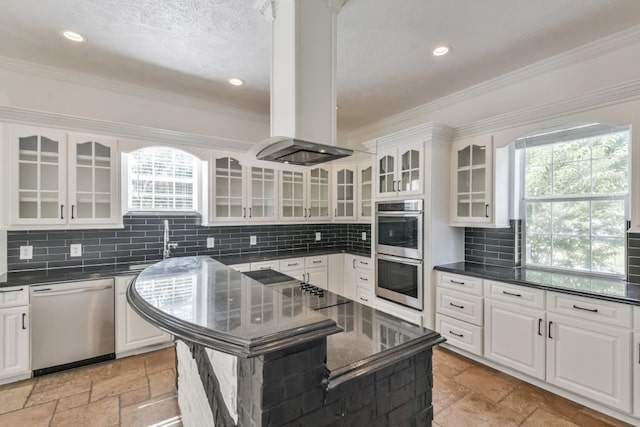 kitchen featuring stainless steel appliances, white cabinets, tasteful backsplash, and light tile floors