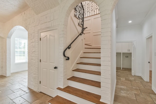 stairway with tile flooring