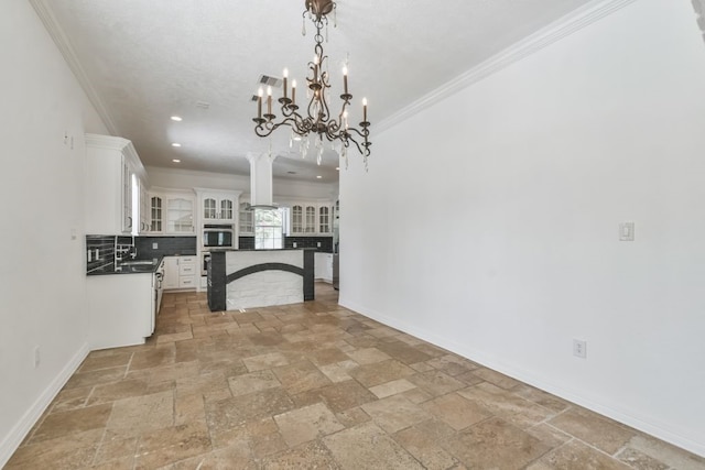 interior space featuring white cabinetry, decorative light fixtures, backsplash, a notable chandelier, and light tile floors