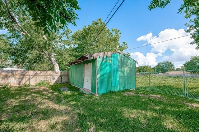 view of outdoor structure featuring a yard