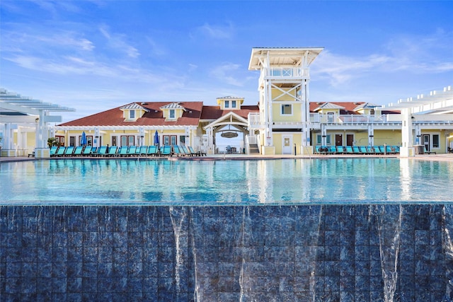 view of swimming pool featuring a pergola