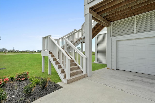 exterior space featuring a yard and a garage