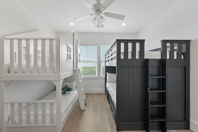 bedroom featuring light hardwood / wood-style floors and ceiling fan