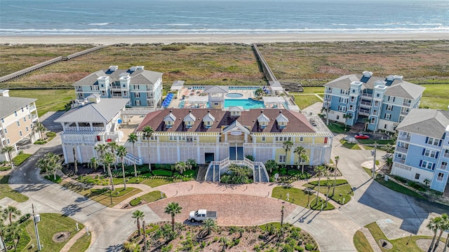 aerial view with a view of the beach and a water view