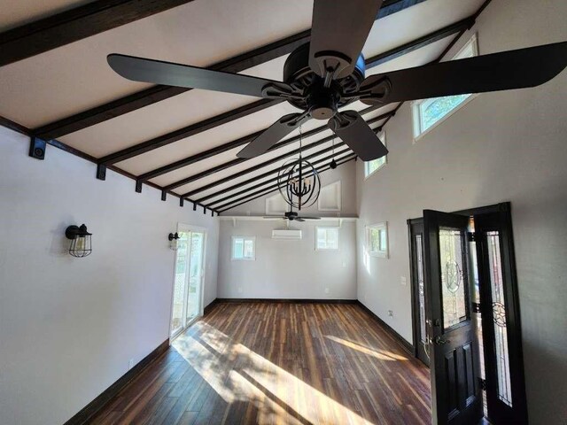 interior space with beamed ceiling, ceiling fan, plenty of natural light, and dark wood-type flooring