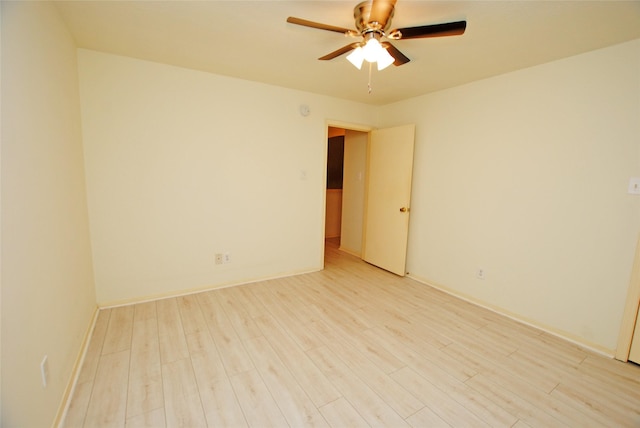 unfurnished room featuring light wood-type flooring and ceiling fan