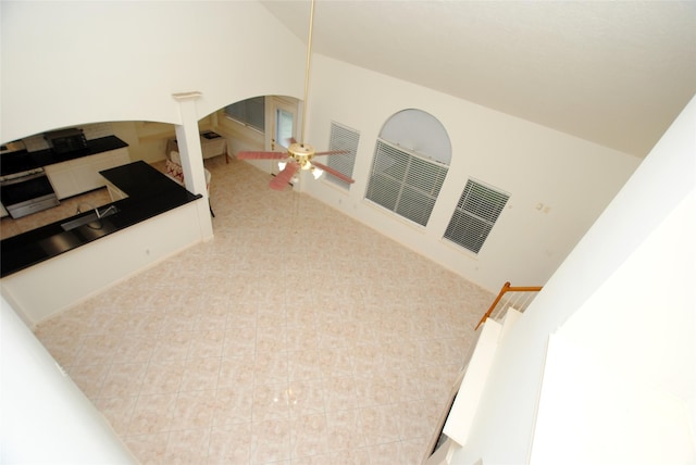 interior space featuring ceiling fan