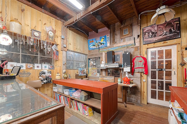 miscellaneous room featuring wood ceiling, wooden walls, dark hardwood / wood-style floors, and beam ceiling