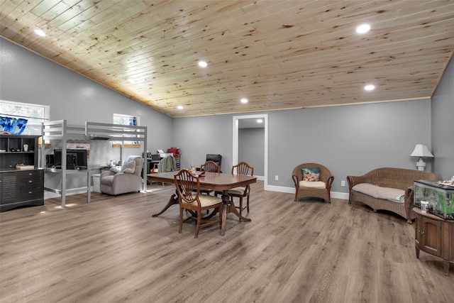 dining room featuring light hardwood / wood-style flooring, high vaulted ceiling, and wooden ceiling