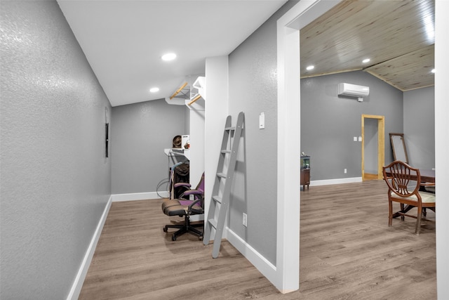 office featuring light hardwood / wood-style flooring and lofted ceiling