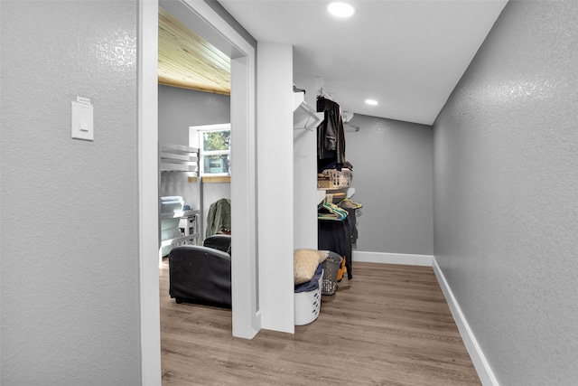 corridor featuring hardwood / wood-style flooring