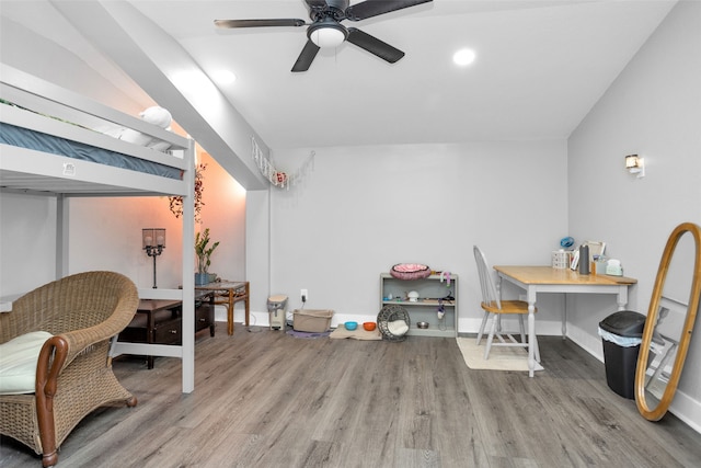 interior space featuring vaulted ceiling, ceiling fan, and hardwood / wood-style floors