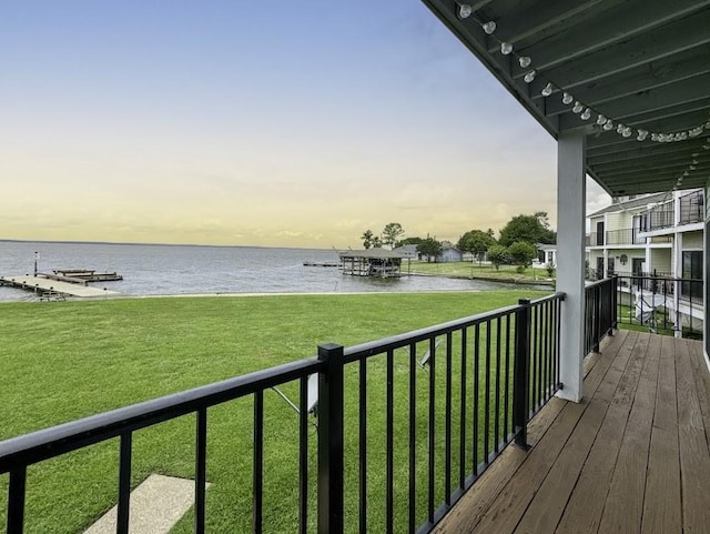 balcony at dusk with a water view