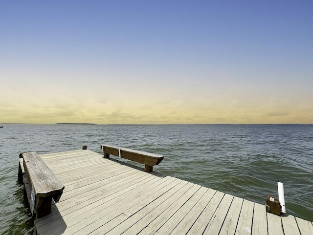 view of dock with a water view