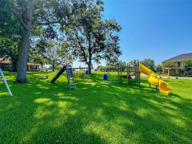 view of play area featuring a lawn