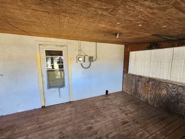 spare room featuring dark hardwood / wood-style floors