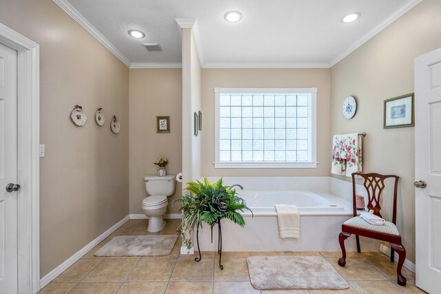 bathroom featuring a washtub, tile patterned floors, crown molding, and toilet