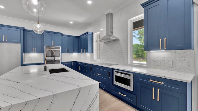 kitchen with ornamental molding, black electric cooktop, light stone counters, and wall chimney exhaust hood