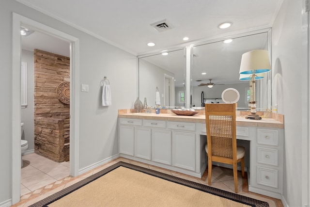 bathroom featuring ceiling fan, tile flooring, toilet, and vanity