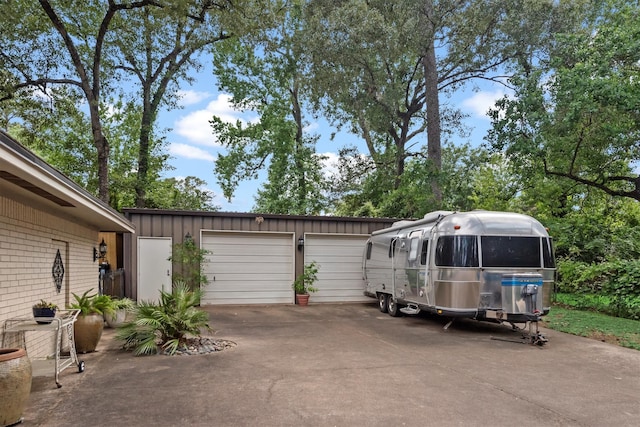 view of parking with a garage