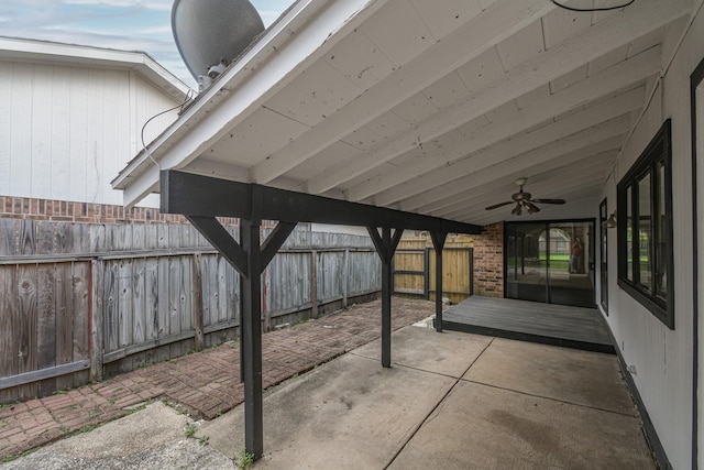 view of patio featuring ceiling fan