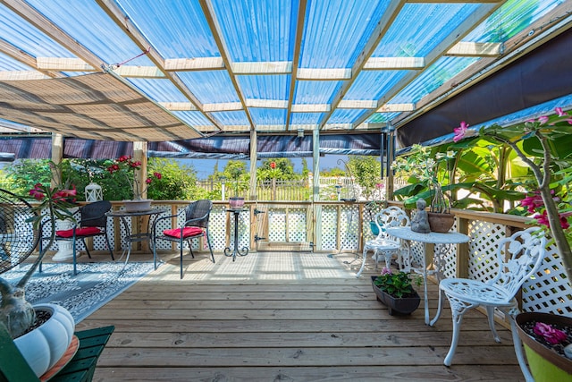 wooden deck featuring a pergola