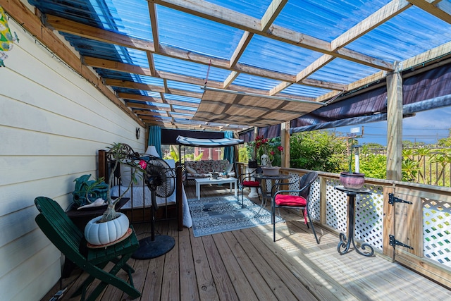 wooden deck with a pergola