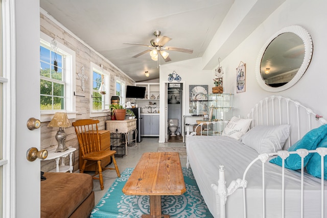 bedroom featuring ceiling fan and lofted ceiling