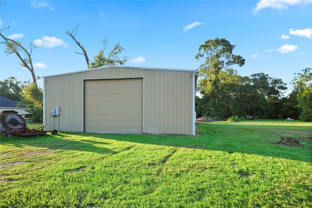 garage featuring a yard