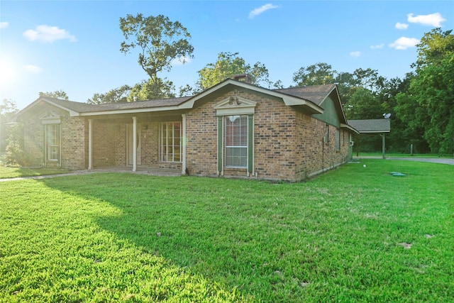 view of property exterior featuring a lawn