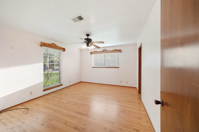 unfurnished room featuring light hardwood / wood-style floors and ceiling fan