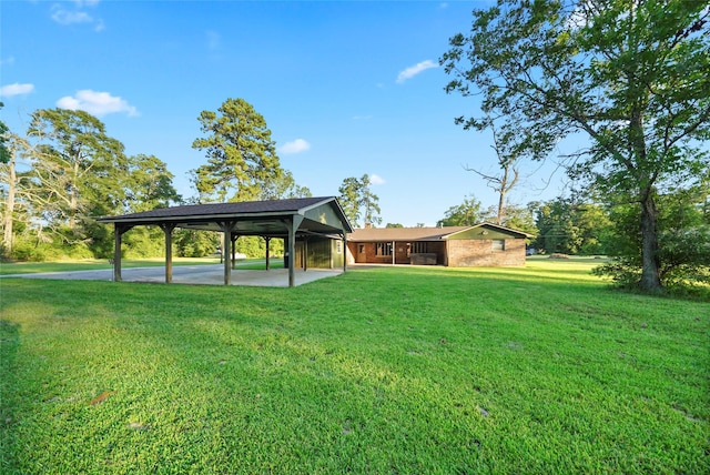 view of yard featuring a carport