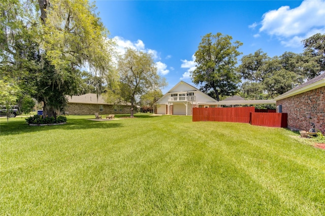 view of yard with a garage