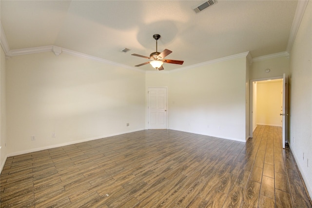 empty room featuring lofted ceiling, crown molding, dark wood-type flooring, and ceiling fan