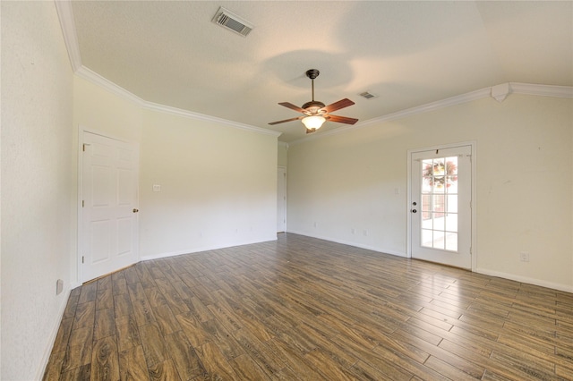 empty room with vaulted ceiling, dark hardwood / wood-style floors, ceiling fan, crown molding, and a textured ceiling