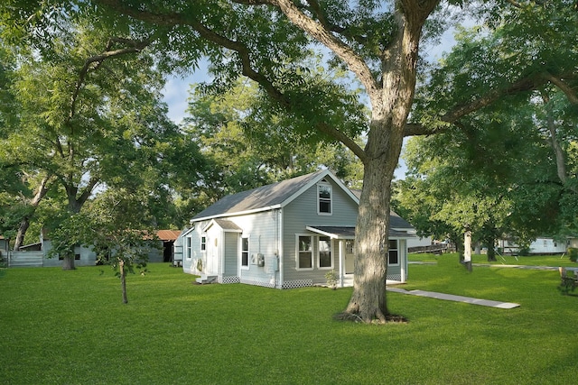 view of property exterior with a yard