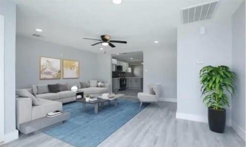 3437 Lydia St, Houston, TX 77021 - living area with wood finished floors, baseboards, ceiling fan, and recessed lighting