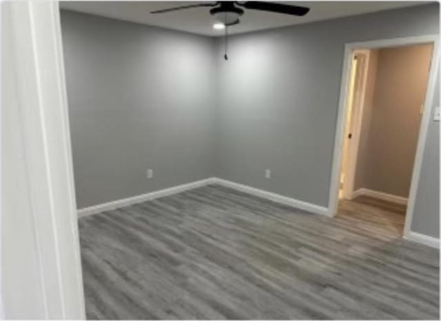 3437 Lydia St, Houston, TX 77021 - unfurnished room with ceiling fan, baseboards, and wood finished floors