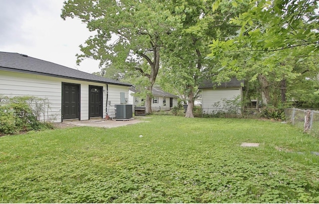 view of yard with central AC unit