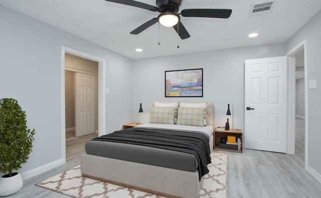 3437 Lydia St, Houston, TX 77021 - bedroom featuring wood finished floors, baseboards, ceiling fan, and recessed lighting