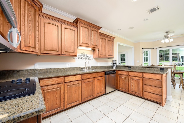 kitchen featuring ceiling fan, sink, stainless steel dishwasher, crown molding, and light tile patterned floors