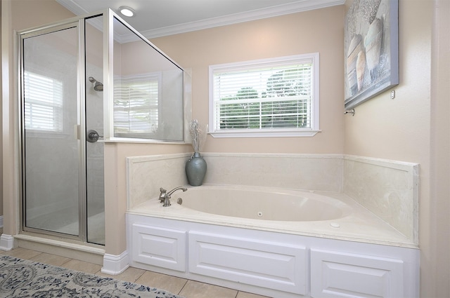 bathroom featuring tile patterned flooring, plenty of natural light, ornamental molding, and independent shower and bath