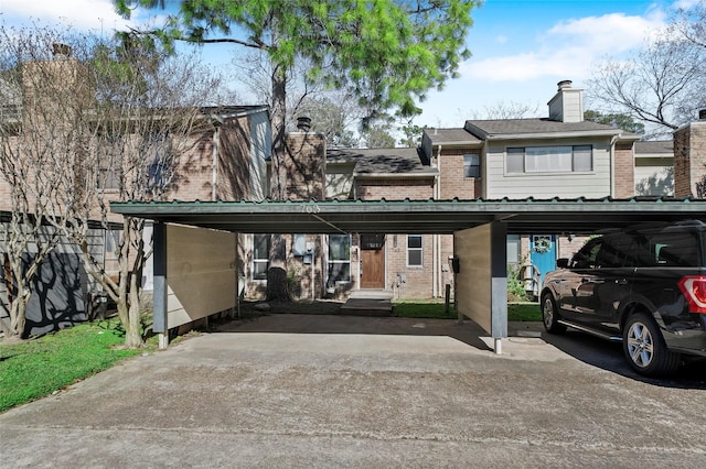 view of front of house with a carport