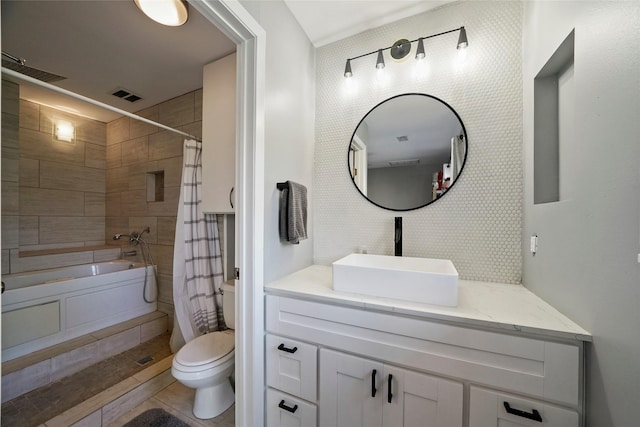 bathroom with toilet, walk in shower, decorative backsplash, and tile patterned flooring