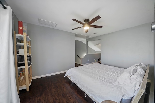 bedroom featuring ceiling fan and dark hardwood / wood-style floors