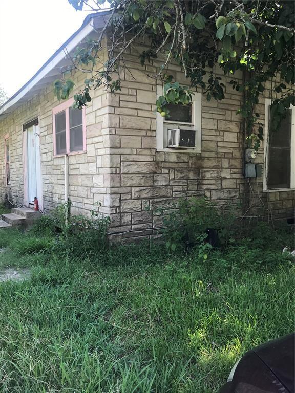 view of side of home with cooling unit