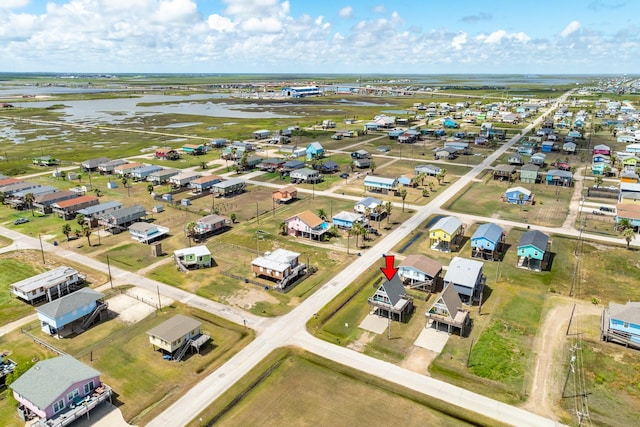 312 Angel Wing, Surfside Beach, TX 77541 - aerial view of property's location featuring a nearby body of water and nearby suburban area